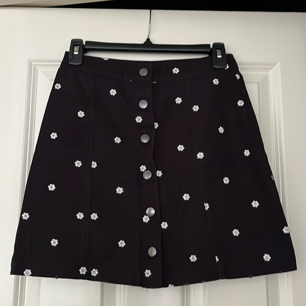 Francesca’s black skirt stretchy denim
